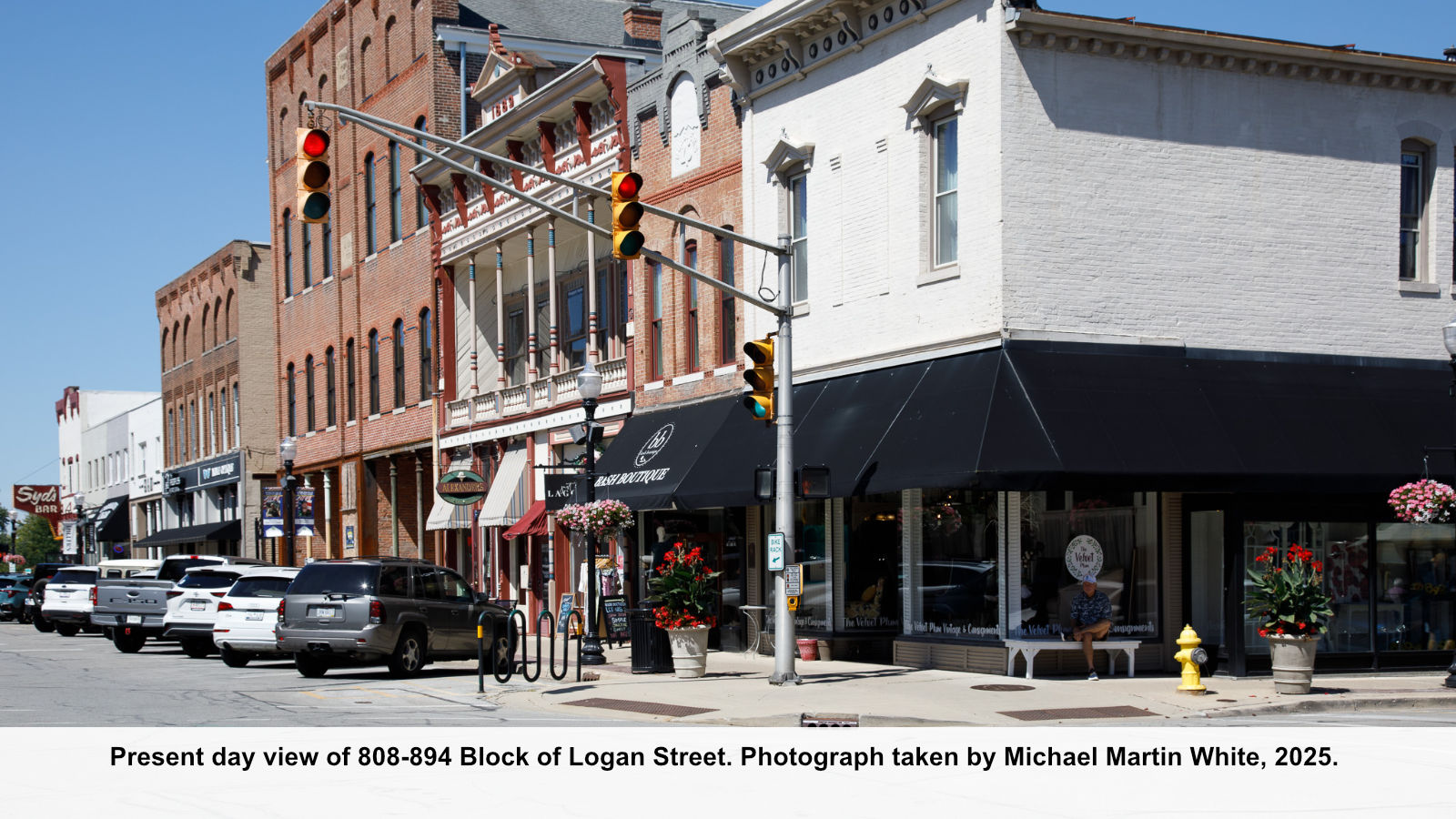 Present day view of 808-894 Block of Logan Street. Photograph taken by Michael Martin White, 2025.